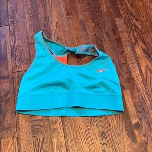Green and orange Nike sports bra